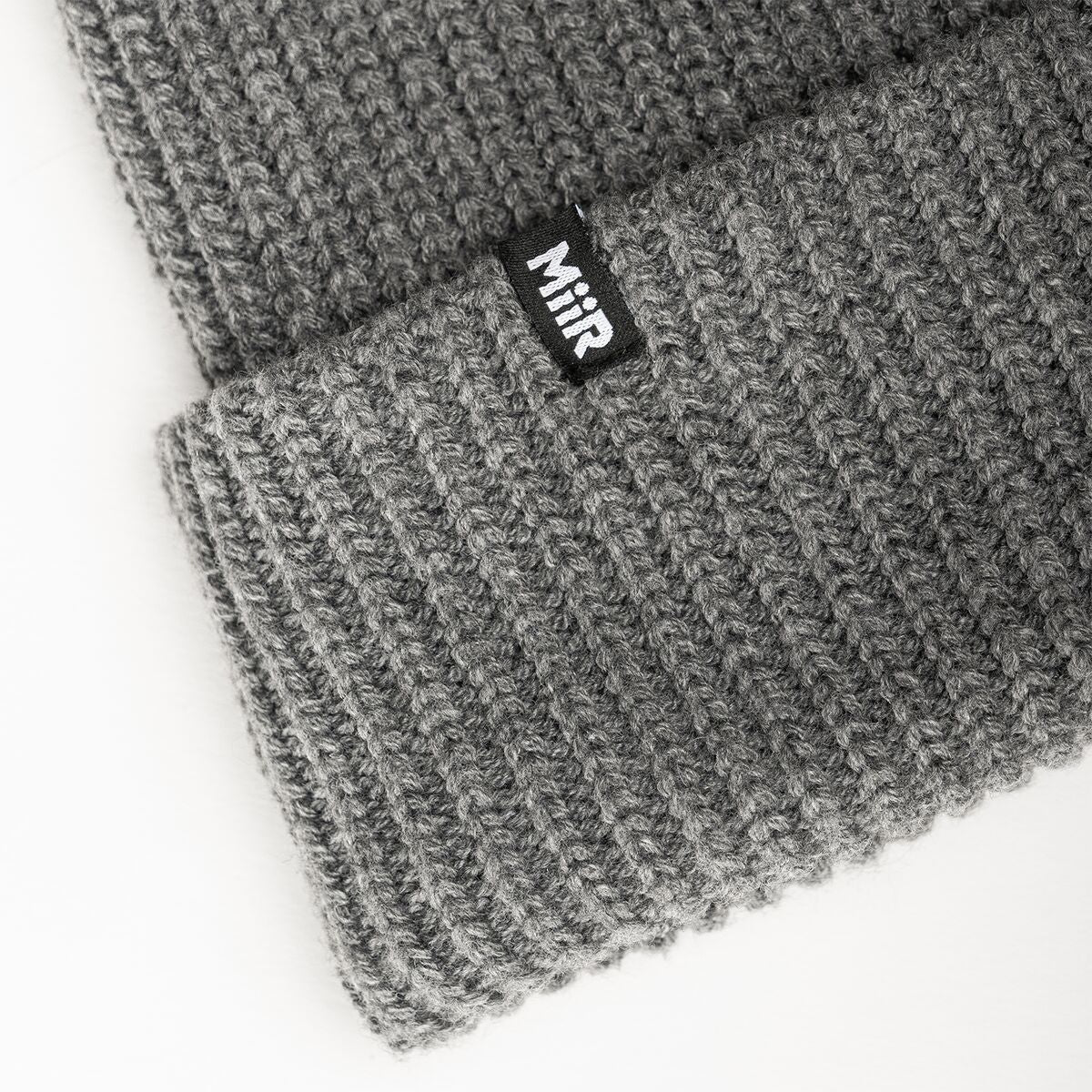 jodie-williams-beanie-i2 WebPDP-RecycledPolyRibBeanie_Studio_TagDetail_GrayHeather__BNE002400OS.jpg
